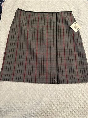 Vintage George plaid lined skirt with faux leather trim.